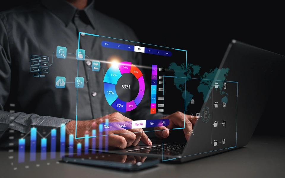 Hands analyzing digital financial data on laptop.